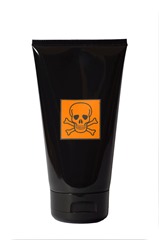 Black cosmetics tube with danger chemical ingredients sign isolated on white