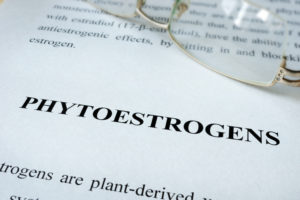 Picture of a paper titled Phytoestrogens, with glasses resting, indicating review