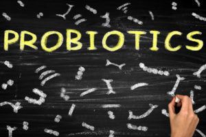 the word probiotics written on a board