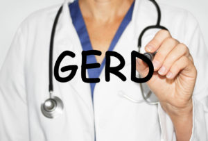 Doctor writing word GERD, Medical concept