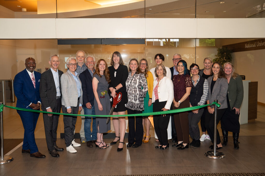 Ribbon cutting team with mayor, governor, state senators